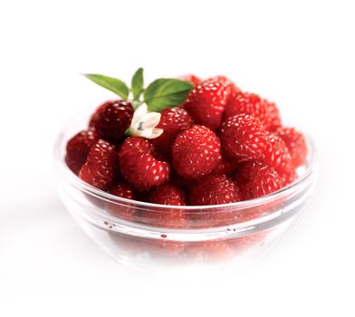 Assorted berries in bowl on natural background. Selectve focus