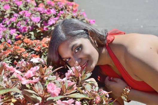 Attractive brunette lady in the park on a sunny Saturday morning