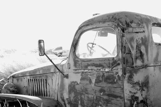 Old abandoned truck in black and white