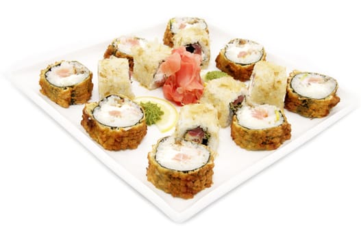 Japanese rolls at the restaurant on a white background