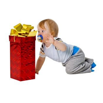 A little boy gets a big gift in red box isolated on white background