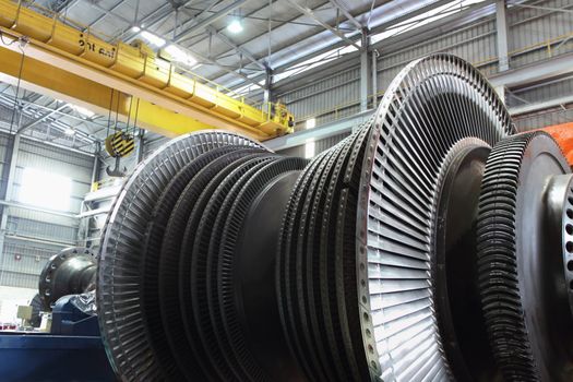 Turbine being worked on in an industrial manufacturing factory