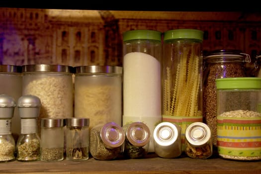 compact storage of cereals and spices in kitchen
