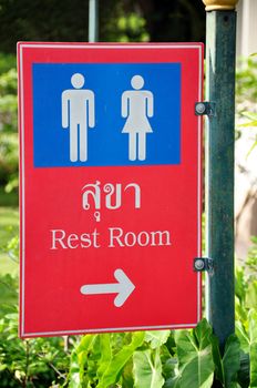 Restroom signs for men and women in Thailand