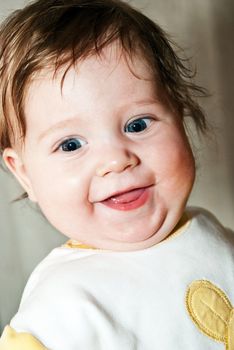 Close-up portrait of a happy little boy.