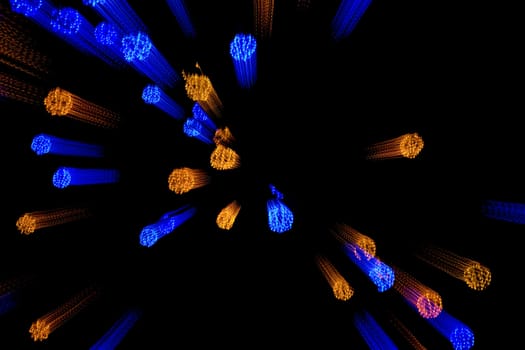 Abstract varicolored lights in the night sky