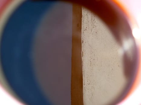 a reflection on the surface of some coffee