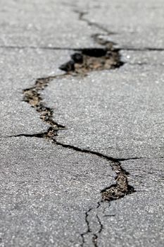 close up of a crack in the street