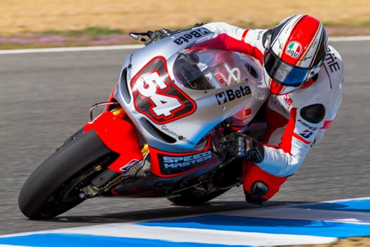 JEREZ DE LA FRONTERA, SPAIN - MAR 23: MotoGP motorcyclist Mattia Pasini takes a curve in the MotoGP Official Trainnig on March 23, 2012 in Jerez de la Frontera, Spain