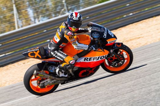JEREZ DE LA FRONTERA, SPAIN - MAR 19: Moto2 motorcyclist Marc Marquez takes a curve in the MotoGP Official Trainnig on March 19, 2012 in Jerez de la Frontera, Spain