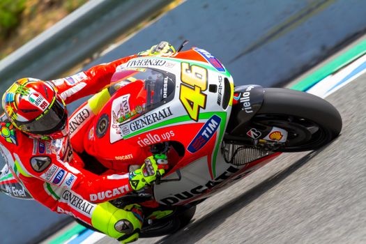 JEREZ DE LA FRONTERA, SPAIN - MAR 25: MotoGP motorcyclist Valentino Rossi takes a curve in the MotoGP Official Trainnig on March 25, 2012 in Jerez de la Frontera, Spain
