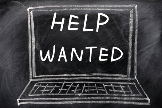 Help wanted written on a blackboard,with a chalk drawing of laptop