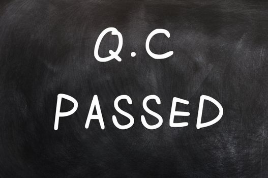 QC passed written with chalk on a chalkboard 