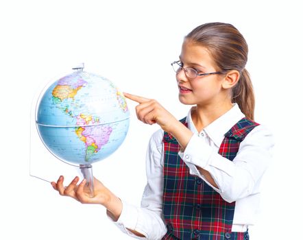 Schoolgirl holding a globe. Isolated. Vertical view