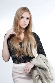 girl model in a business suit on white background