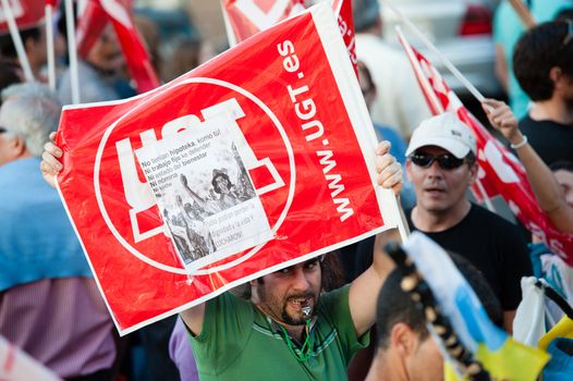 LAS PALMAS, SPAIN–MARCH 29: Unidentified workers protesting against new labor reforms and austerity cuts, during the Spanish general strike 29-M on March 29, 2012 in Las Palmas, Spain
