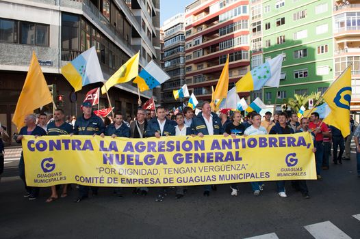 LAS PALMAS, SPAIN–MARCH 29: Unidentified workers protesting against new labor reforms and austerity cuts, during the Spanish general strike 29-M on March 29, 2012 in Las Palmas, Spain
