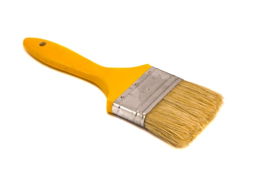 Brush 75mm wide with a yellow shaft isolated on white background. Paint tool.