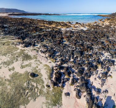 Beach with volcanic stones, Lanzarote, Canary Islands, Spain