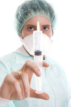 Nurse holding a syringe - isolated over white