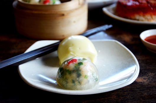 crystal chives dumpling and  mini buns  on dish