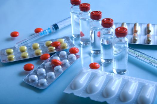 Pharmaceutical products - syringe and pills 