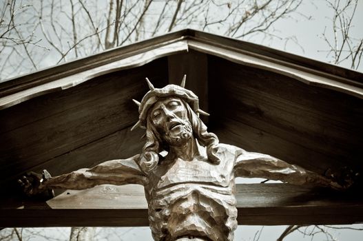 Carved wooden depiction of christ on a cross