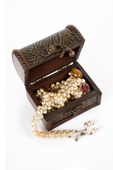 Treasure chest with jewelry, isolated on white background 