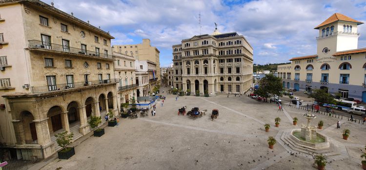 Panoramic view of Old Havana plaza and typical building