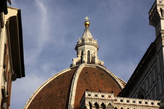Tourists on the top of the Duomo (Basilica di Santa Maria del Fiore) in Florence, Italy.