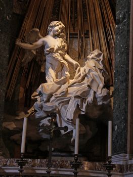 The Ecstasy of Saint Teresa, located in  Santa Maria della Vittoria, Rome, Italy.  The sculpture was by Giovanni Lorenzo Bernini. 