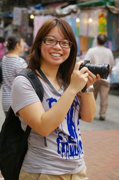 Asian woman photographer