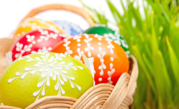 Easter Hand Painted Eggs in Basket With Grass in Background