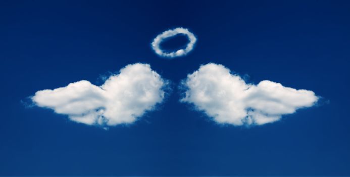 Angel wings and nimbus formed from beautiful fluffy clouds  