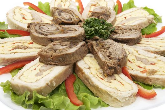 several kinds of meatloaf on white background