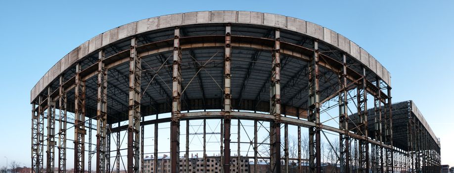Panoramic abandoned construction, only steel columns without any wall