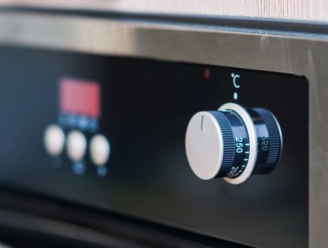 controls on the oven for a close-up