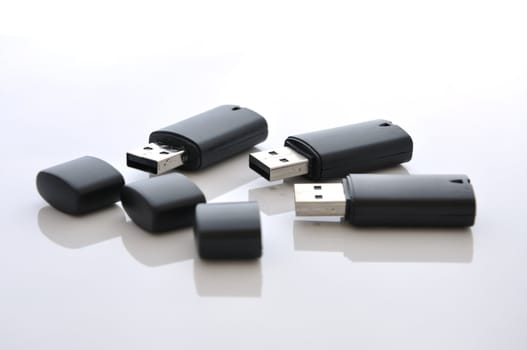 Black usb flash disks, open and ready for use.