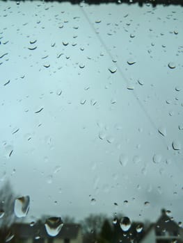 rain droplets on a window of a house