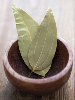 close up of a bowl of bay leaves