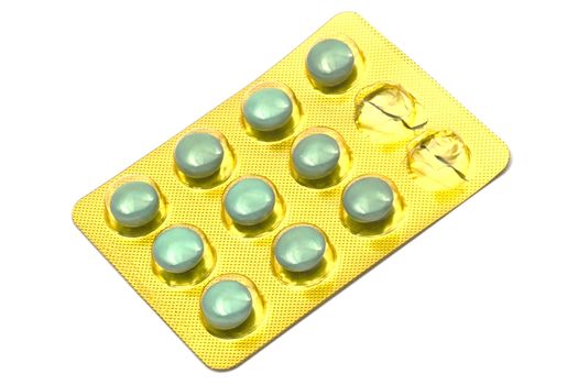 Package of Green Pills Closeup on white