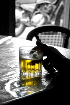 A beer glass on a table