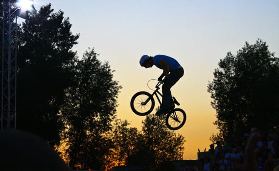 BMX Cyclist jumps through the air at the world championships in Cologne in 2008