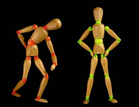 Concept of health life � two puppets with colored joints 