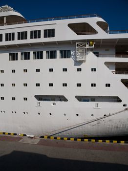 White passenger cruise ship in the port 