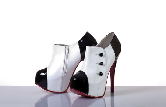Sexy modern female shoes, studio shot on white background 