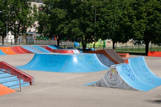 empty skate park with ramps and other elements