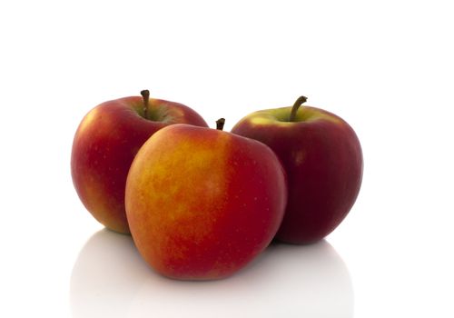 three red appels islated on white