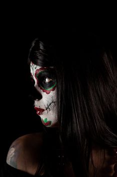 Portrait of Sugar skull girl, isolated on black background 