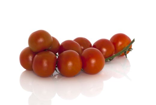 isolated fesh red cherry tomatoes 